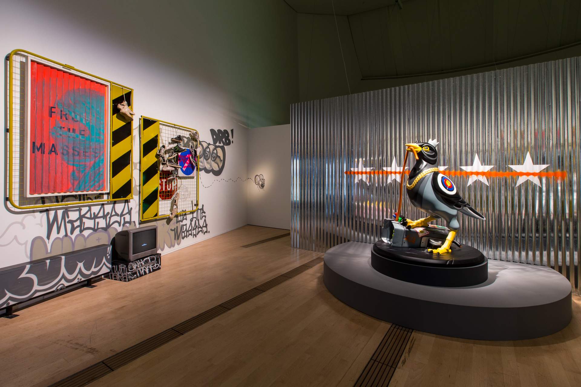 Regardless, the Streets are HERE (2023) by HURUHARA; A Myna Rebellion (2023) by Sam Lo 'SKL0'_1, at Artscience Museum's exhibition, Sneakertopia: Step Into Street Culture.