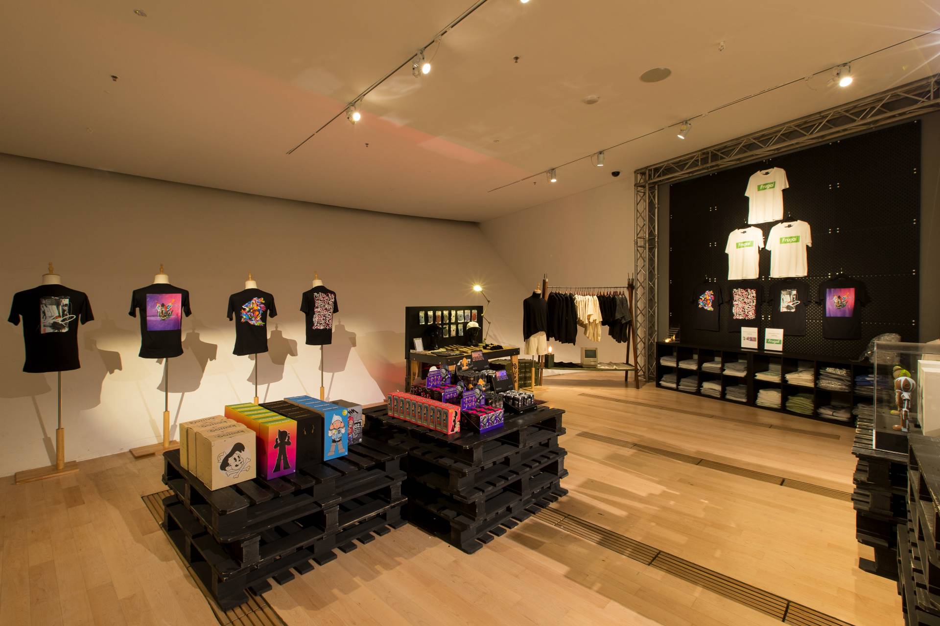Merch store at Sneakertopia with some exclusive collectables, fresh apparel, rare kicks from Limited Edt.